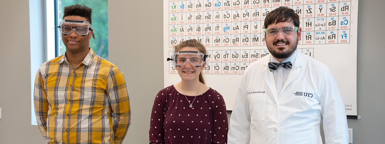 Assistant Chemistry Professor Dr. Alex Manzewitsch with students Taylor Hollis and Joshua Neath (Photo by Noah Allard)