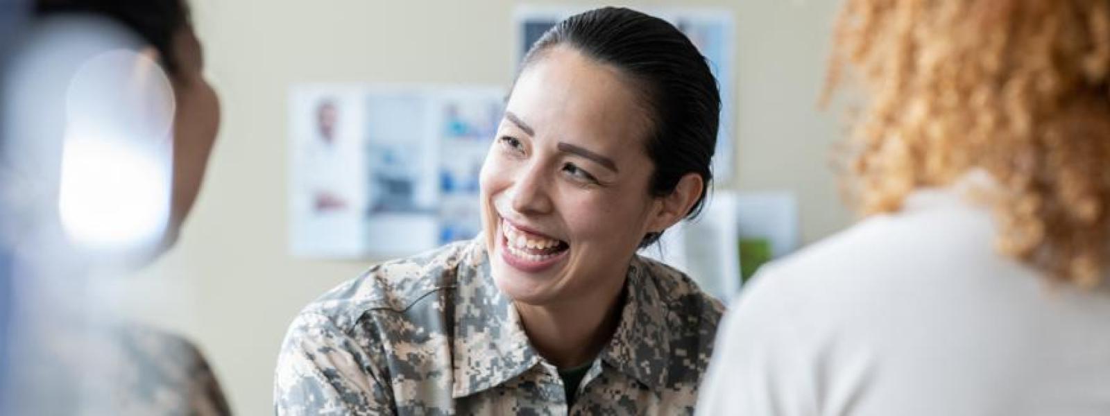 Female soldier smiling.