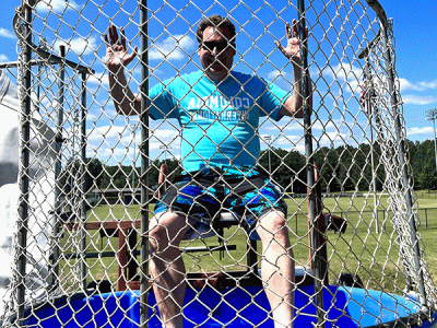 Dr. David Dewitt, dean of the College of Arts & Sciences challenges his students to dunk him. 